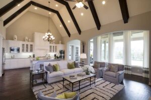 Picture of a beautiful living room with a vaulted ceiling and exposed beams.